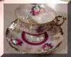 White Lustreware Cup and Saucer